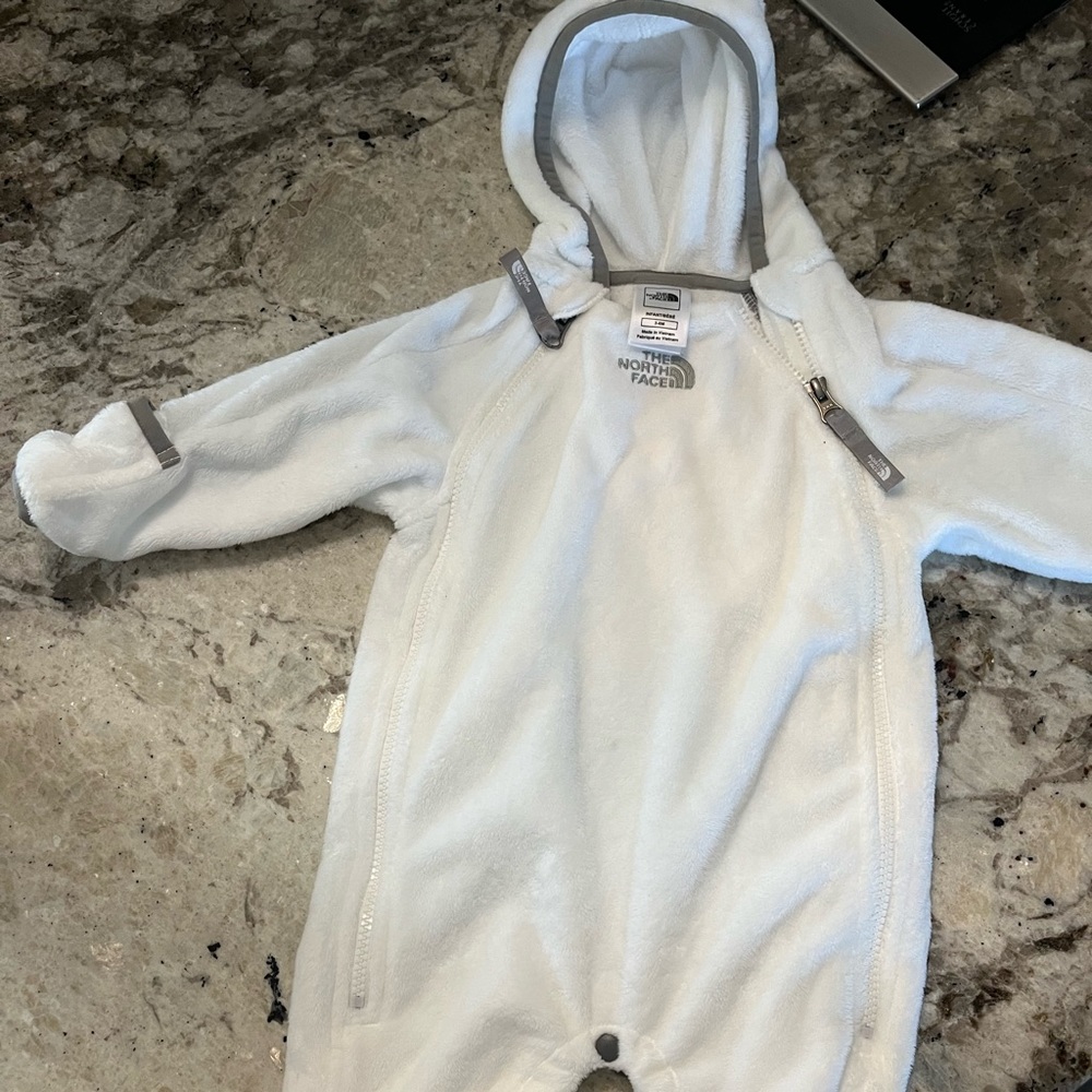 white soft northface kids zip-up onesie coat